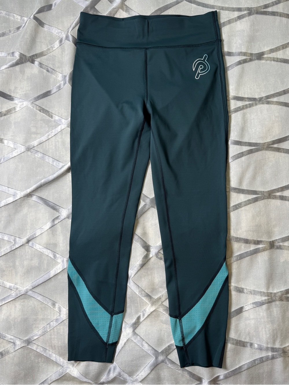 Peloton Teal Leggings.  Size L.  Like new, never worn. Mesh details